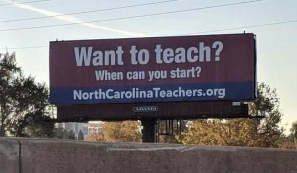 Pictured: Billboard with advertisement, "Want to teach? When can you start? NorthCarolinaTeachers.org."